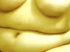 Close up on fat tummy as she masturbates 