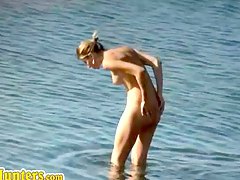 Sizzling naked bodies on the beach