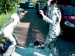 Two ladies fight with wet paint