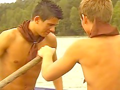 Two gay boys start sucking in boat and go to shore to fuck 