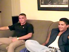 Two hot dudes jerking on the couch